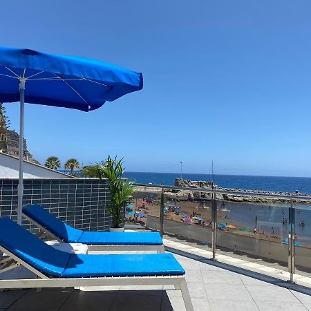 Billy'S Beachfront Apartment With Pool Access プエルト・デ・モガン エクステリア 写真